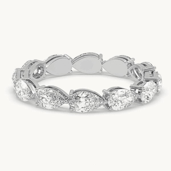 vestuvinis žiedas iš platinos - deimantinė juostelė su lašo formos deimantais