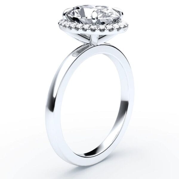 Klasikinis sužadėtuvių žiedas su deimantu ir halo juostele iš balto aukso arba platinos - oval cut