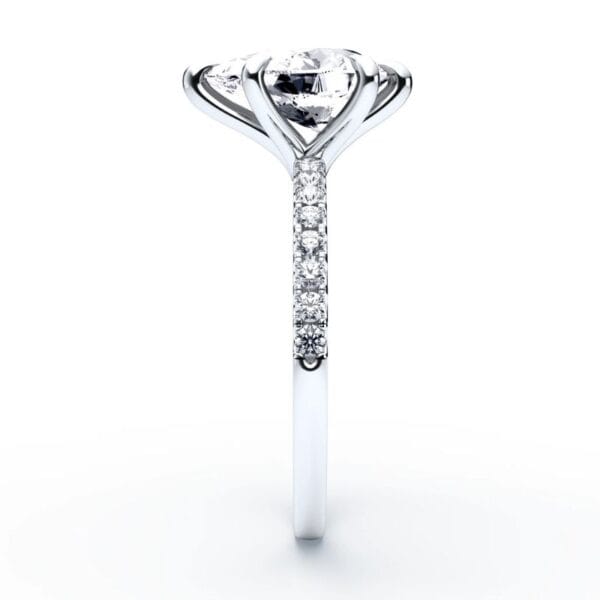 Modernus sužadėtuvių žiedas su deimantais iš balto aukso arba platinos - pear cut